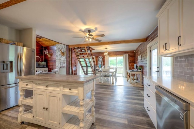 43 901st Rd, Clinton, MO 64735 - kitchen with light countertops, a ceiling fan, appliances with stainless steel finishes, dark wood finished floors, and white cabinetry