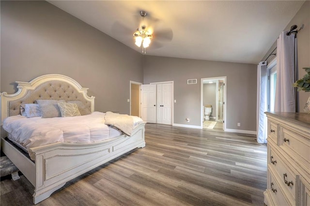 43 901st Rd, Clinton, MO 64735 - bedroom with baseboards, ensuite bathroom, a ceiling fan, visible vents, and wood finished floors