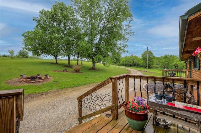 43 901st Rd, Clinton, MO 64735 - deck featuring a fire pit and a lawn