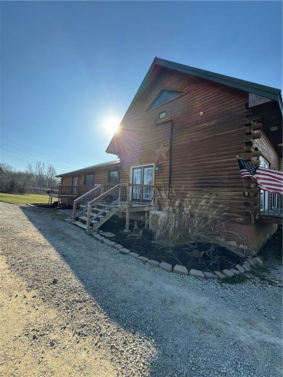 43 901st Rd, Clinton, MO 64735 - view of home's exterior featuring log siding