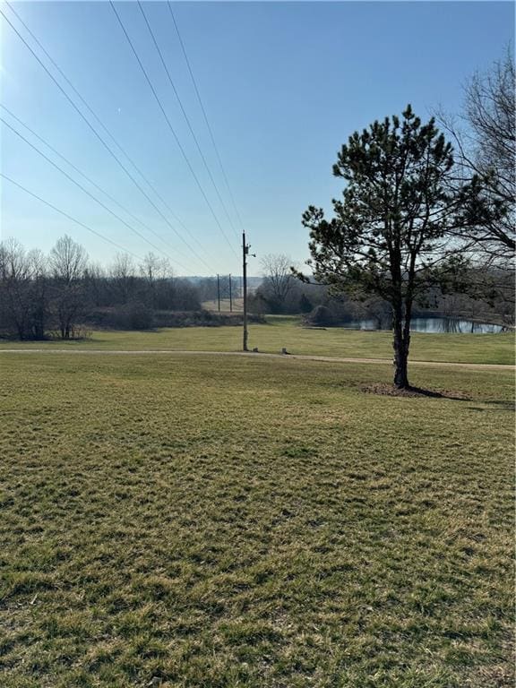 43 901st Rd, Clinton, MO 64735 - view of community featuring a water view and a lawn