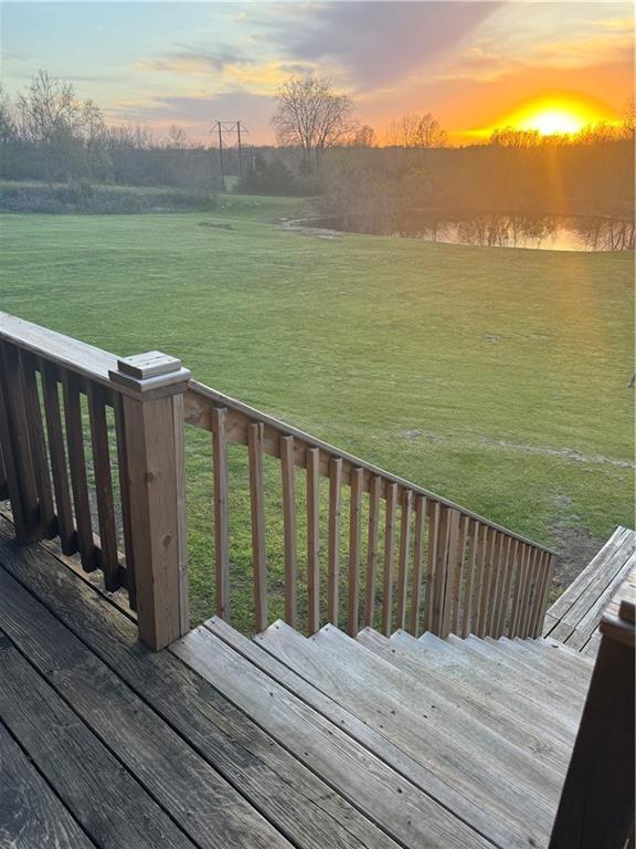 43 901st Rd, Clinton, MO 64735 - wooden deck featuring a yard