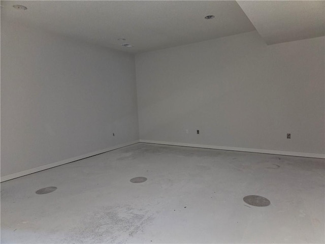4967 146th St, Basehor, KS 66007 - empty room with concrete flooring and baseboards