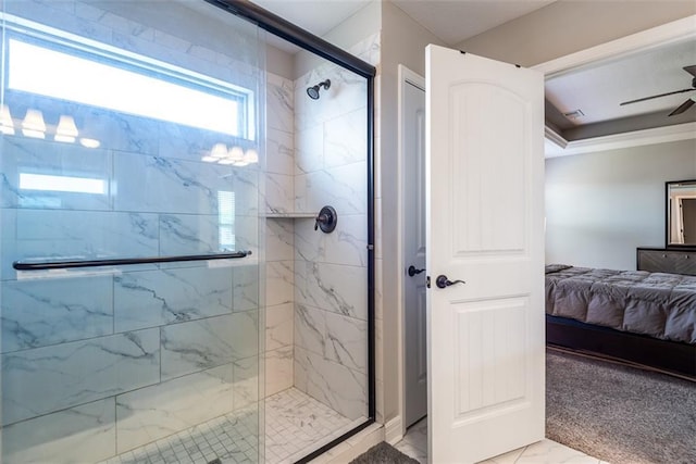 309 NE 102nd Ter, Kansas City, MO 64155 - ensuite bathroom with marble finish floor, a ceiling fan, a stall shower, and ensuite bathroom