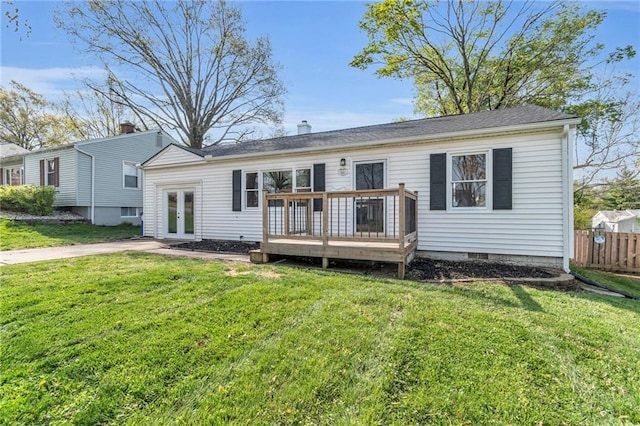 2411 NE 60th St, Gladstone, MO 64118 - rear view of property with french doors, a lawn, fence, and a deck