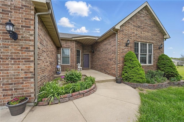 797 NW 1621st Rd, Bates City, MO 64011 - doorway to property featuring brick siding