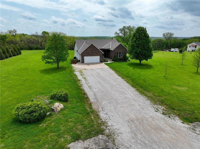797 NW 1621st Rd, Bates City, MO 64011 - view of front facade featuring dirt driveway, a front lawn, and a garage