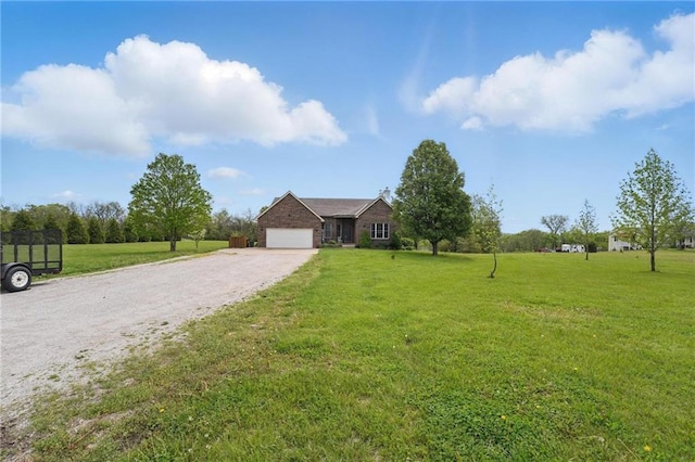 797 NW 1621st Rd, Bates City, MO 64011 - view of front facade featuring a garage, driveway, and a front lawn