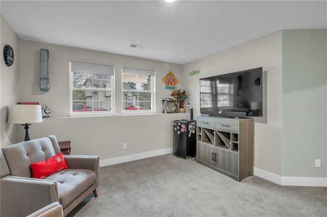 12631 Fountain Lake Cir, Grandview, MO 64030 - sitting room featuring carpet and baseboards