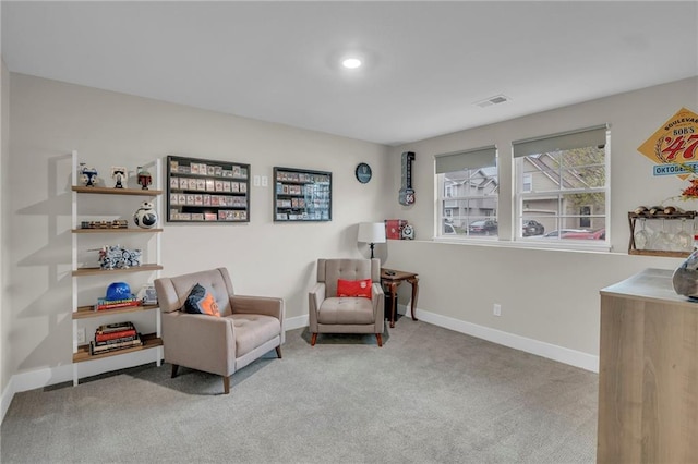 12631 Fountain Lake Cir, Grandview, MO 64030 - living area featuring carpet and baseboards