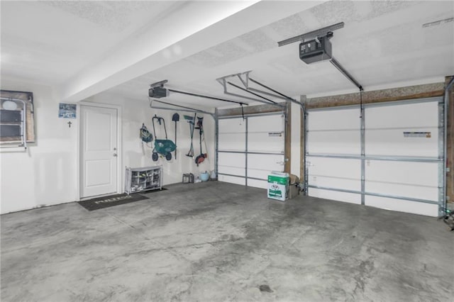 12631 Fountain Lake Cir, Grandview, MO 64030 - garage with a garage door opener