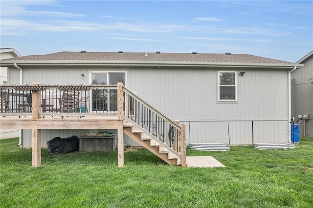 12631 Fountain Lake Cir, Grandview, MO 64030 - rear view of property featuring stairs, a wooden deck, and a yard