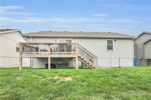 12631 Fountain Lake Cir, Grandview, MO 64030 - rear view of property featuring a yard, stairs, a deck, and roof with shingles