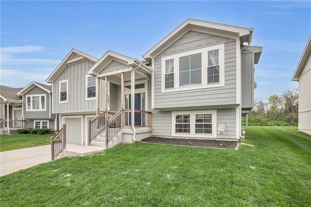 12631 Fountain Lake Cir, Grandview, MO 64030 - bi-level home with driveway, a front lawn, an attached garage, and board and batten siding