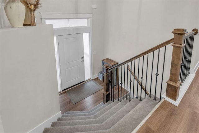 12631 Fountain Lake Cir, Grandview, MO 64030 - foyer with wood finished floors and stairway