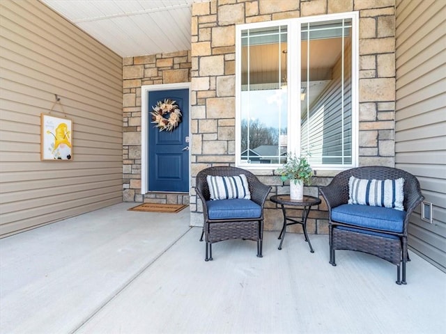 105 Fox Den Ct, Savannah, MO 64485 - property entrance featuring a porch and stone siding