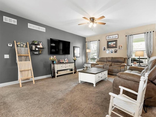 105 Fox Den Ct, Savannah, MO 64485 - carpeted living room featuring visible vents, a ceiling fan, and a healthy amount of sunlight