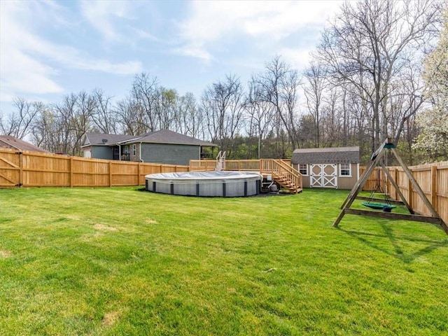 105 Fox Den Ct, Savannah, MO 64485 - view of yard with a fenced backyard, an outdoor structure, a fenced in pool, and a shed