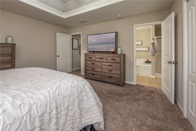 bedroom featuring crown molding, ensuite bathroom, baseboards, carpet flooring, and visible vents