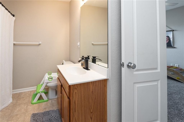 bathroom featuring vanity and tile patterned flooring