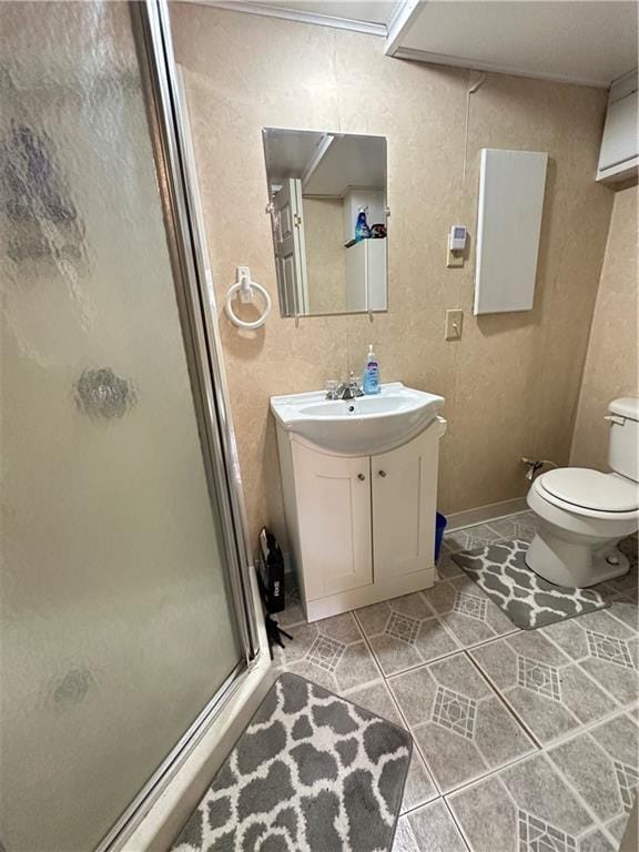 83 Grandview Dr, Warrensburg, MO 64093 - bathroom featuring a stall shower, tile patterned flooring, toilet, and vanity