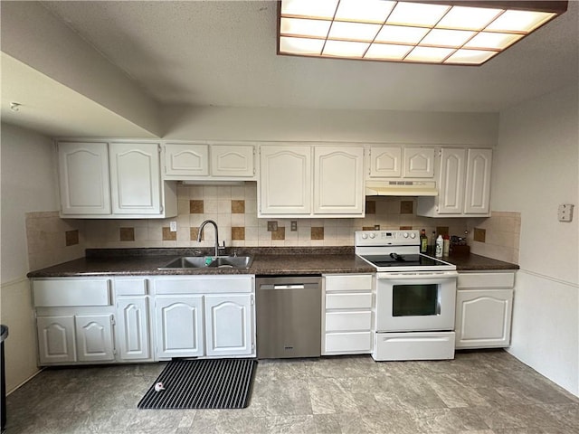 83 Grandview Dr, Warrensburg, MO 64093 - kitchen with stainless steel dishwasher, electric range, a sink, under cabinet range hood, and dark countertops