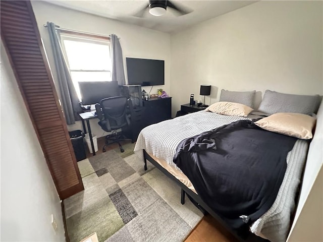 83 Grandview Dr, Warrensburg, MO 64093 - bedroom with ceiling fan and an office area