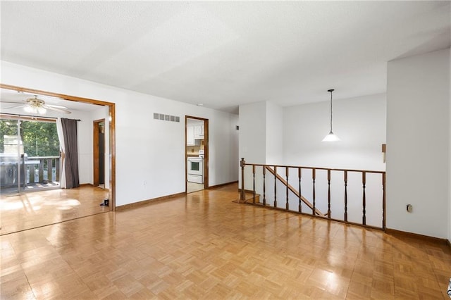 83 Grandview Dr, Warrensburg, MO 64093 - spare room with a ceiling fan and baseboards