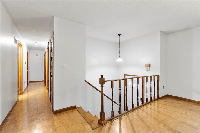 83 Grandview Dr, Warrensburg, MO 64093 - corridor featuring an upstairs landing and baseboards