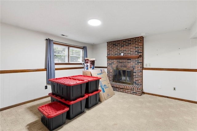 83 Grandview Dr, Warrensburg, MO 64093 - game room with a fireplace, carpet, and a wainscoted wall