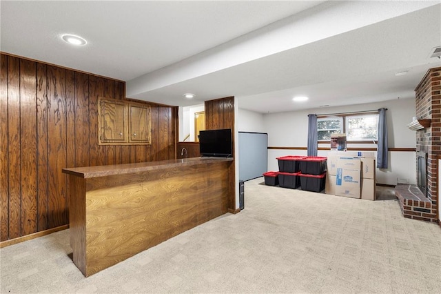 83 Grandview Dr, Warrensburg, MO 64093 - indoor bar featuring carpet, a fireplace, wood walls, and recessed lighting