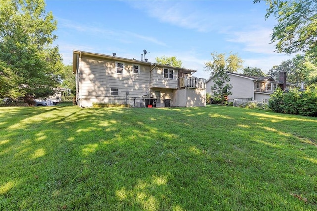 83 Grandview Dr, Warrensburg, MO 64093 - back of house featuring a yard