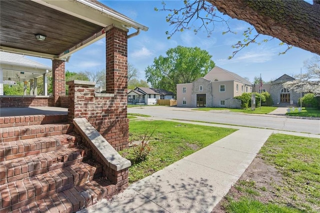 view of yard with a residential view