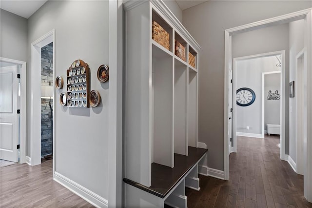 6840 Belmont Dr, Shawnee, KS 66226 - mudroom featuring baseboards and dark wood-type flooring