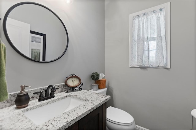 6840 Belmont Dr, Shawnee, KS 66226 - bathroom featuring toilet and vanity