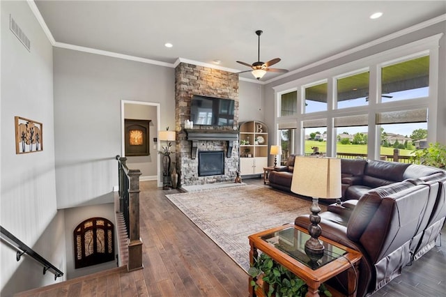 6840 Belmont Dr, Shawnee, KS 66226 - living area with a fireplace, ornamental molding, a ceiling fan, dark wood-type flooring, and recessed lighting
