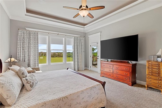 6840 Belmont Dr, Shawnee, KS 66226 - carpeted bedroom featuring a raised ceiling, access to exterior, ornamental molding, and a ceiling fan
