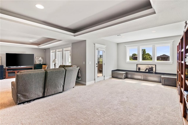 6840 Belmont Dr, Shawnee, KS 66226 - living area with a raised ceiling, carpet floors, recessed lighting, and crown molding
