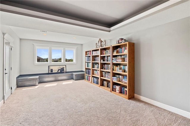 6840 Belmont Dr, Shawnee, KS 66226 - living area with carpet and a raised ceiling