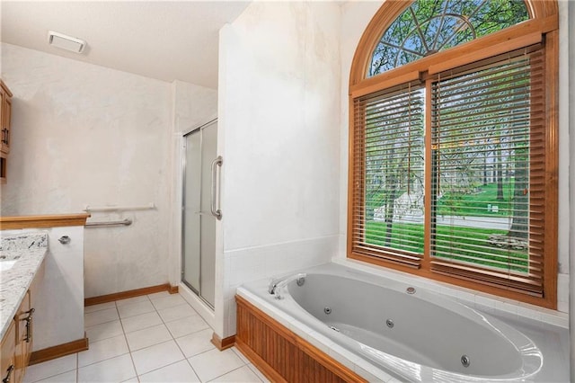 full bath with visible vents, a stall shower, a jetted tub, tile patterned floors, and vanity