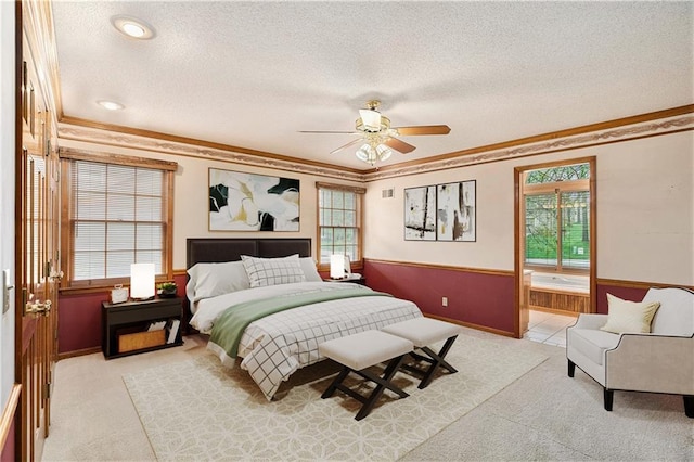3212 N 110th St, Kansas City, KS 66109 - bedroom with multiple windows, light colored carpet, ornamental molding, a textured ceiling, and a wainscoted wall