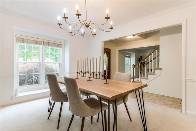 dining area featuring a chandelier, light colored carpet, crown molding, stairs, and baseboards