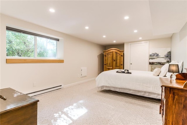carpeted bedroom with baseboard heating, recessed lighting, and baseboards