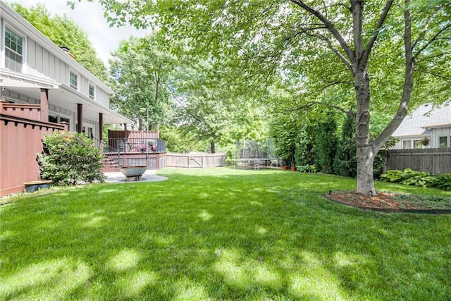 view of yard featuring a trampoline