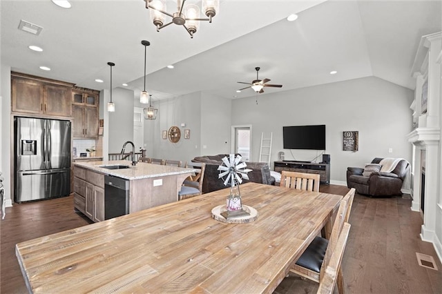 1002 Fox Trot Dr, Odessa, MO 64076 - dining space featuring recessed lighting, ceiling fan, dark wood-type flooring, lofted ceiling, and baseboards