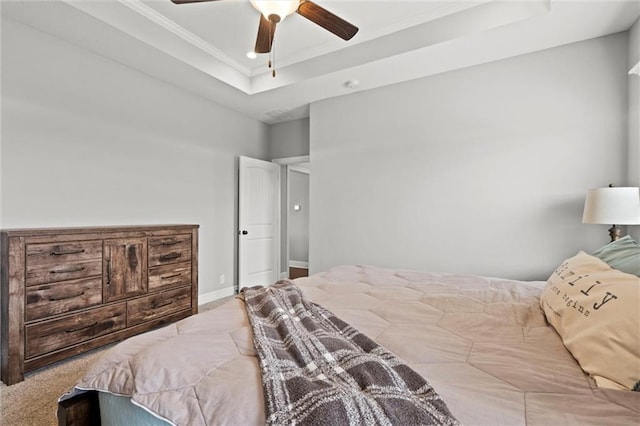 1002 Fox Trot Dr, Odessa, MO 64076 - carpeted bedroom with a raised ceiling, crown molding, ceiling fan, and baseboards