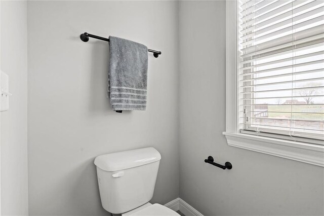 1002 Fox Trot Dr, Odessa, MO 64076 - half bath with toilet and baseboards