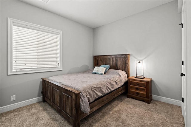 1002 Fox Trot Dr, Odessa, MO 64076 - bedroom featuring light colored carpet and baseboards