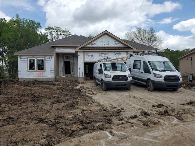 9439 N Belton Ave, Kansas City, MO 64154 - property under construction featuring roof with shingles