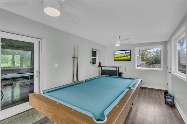 recreation room with baseboards, plenty of natural light, and a ceiling fan